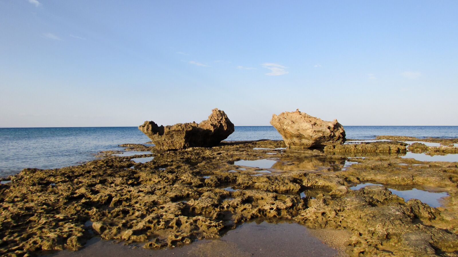 Canon PowerShot SX400 IS sample photo. Rock formation, sea, rocky photography