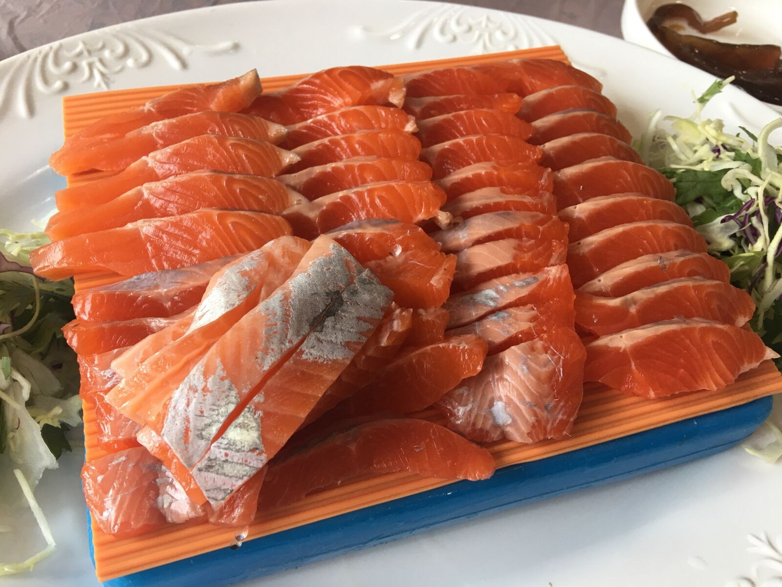 Apple iPhone 6s Plus sample photo. Salmon, tuna, time photography