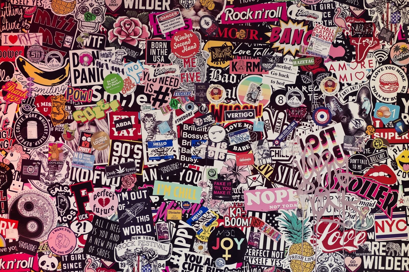 Olympus OM-D E-M10 sample photo. Sticker, wall, color photography