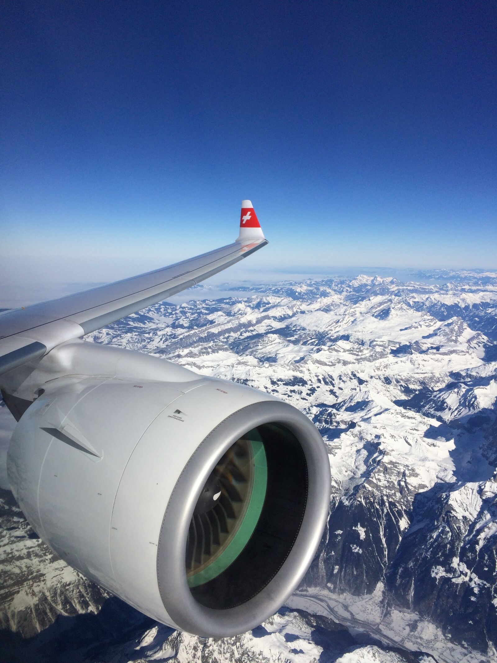 iPhone 5s back camera 4.15mm f/2.2 sample photo. Plane, swiss, alps photography