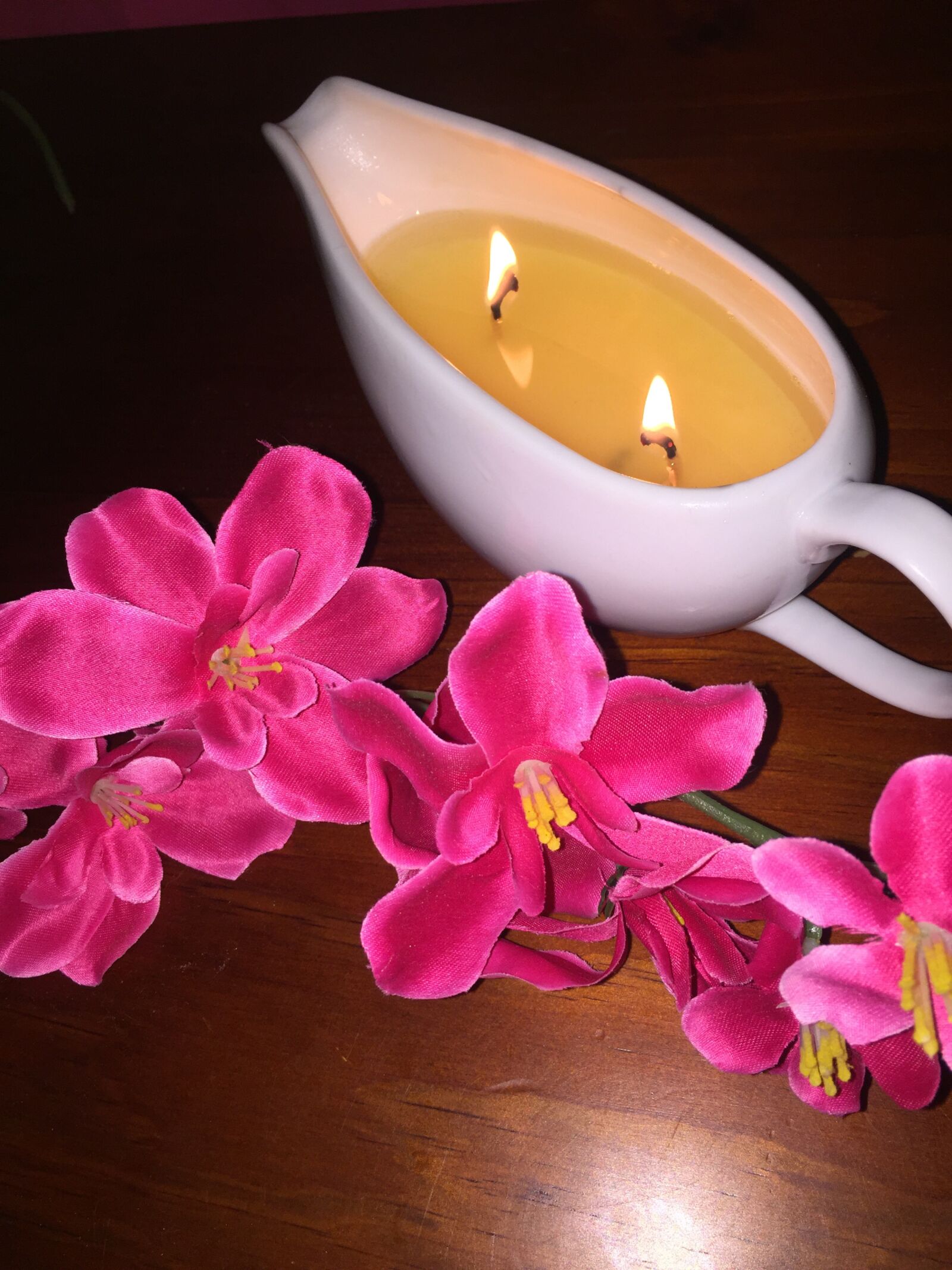 iPhone 6 back camera 4.15mm f/2.2 sample photo. Candle, massage, pink photography