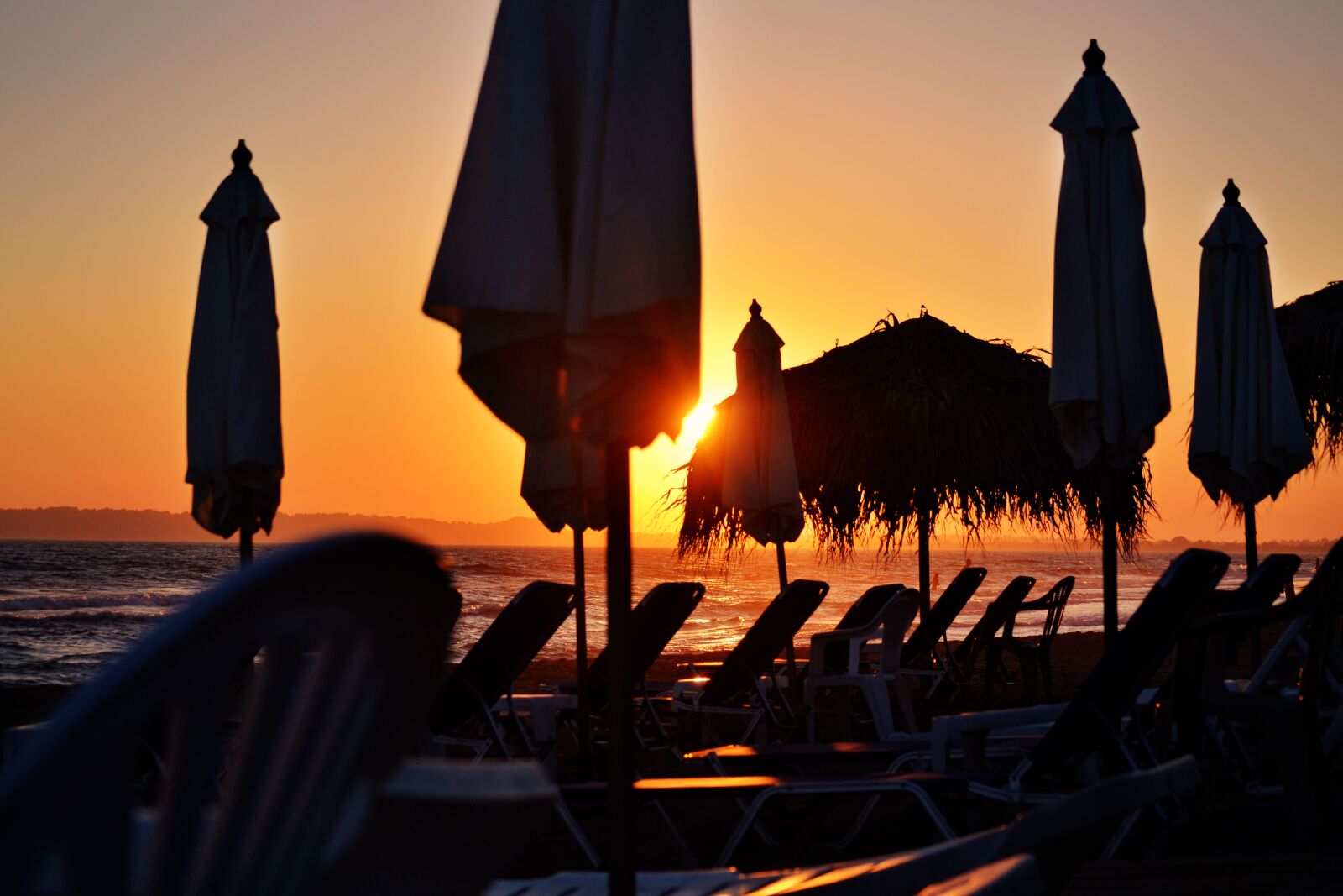 Nikon D3100 sample photo. Beach, sunset, sunbeds photography