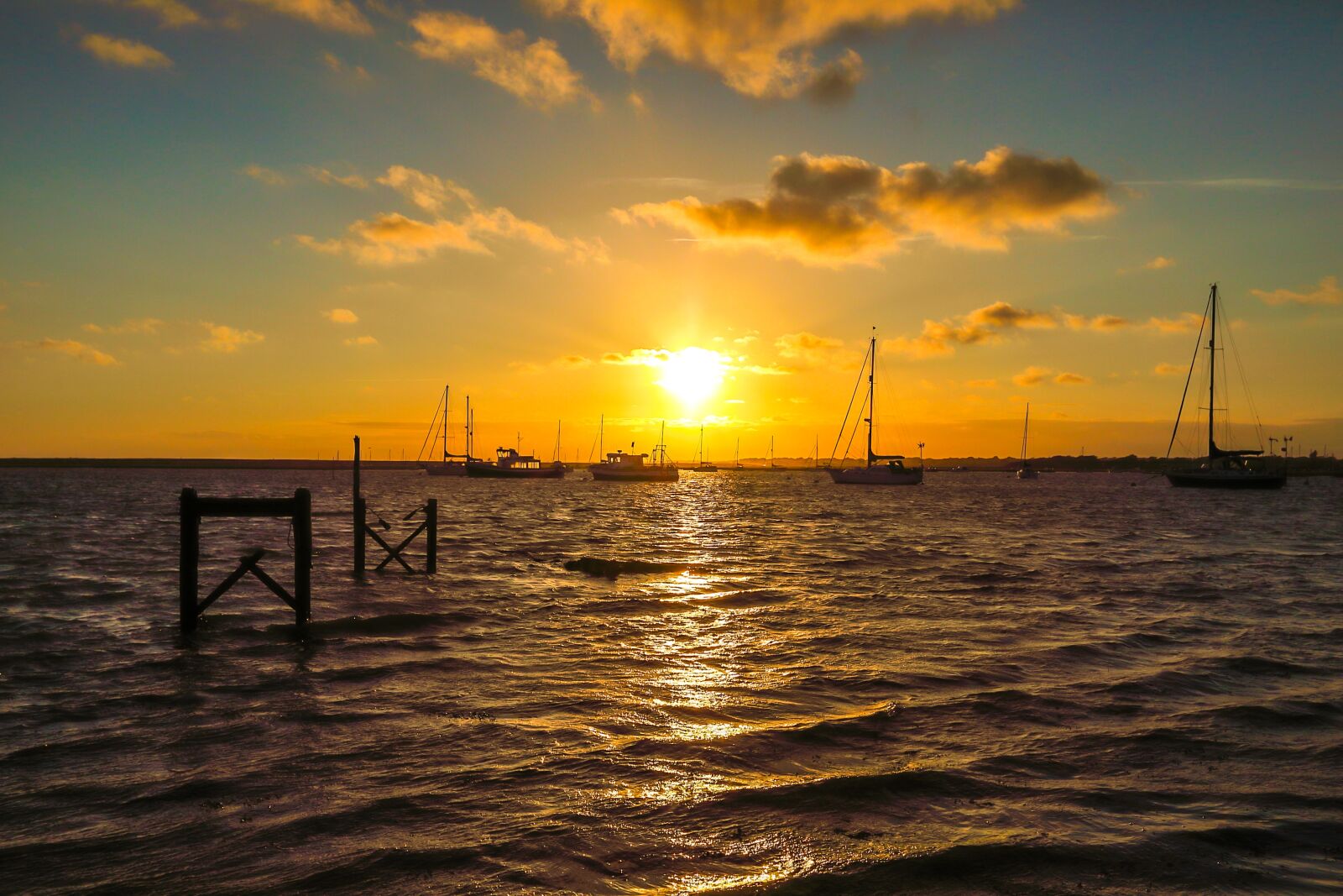 Canon EF 16-35mm F2.8L II USM sample photo. Sunset, yacht, ocean photography