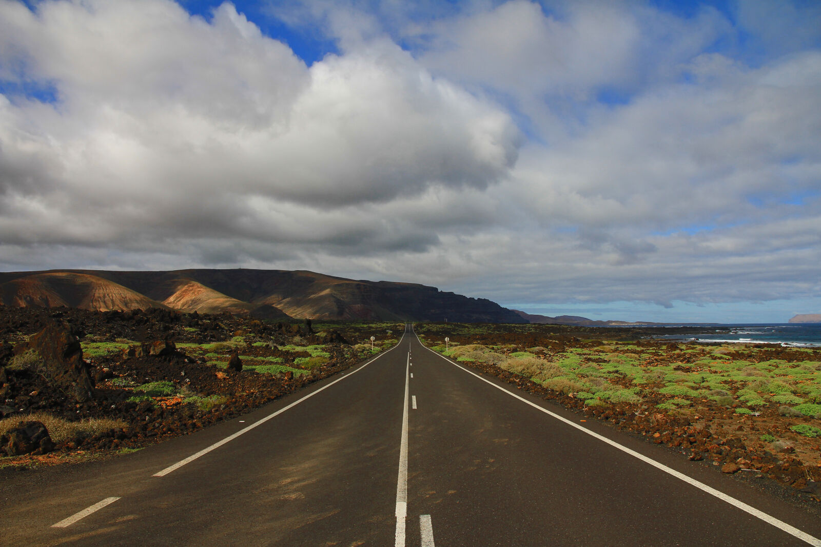 Canon EOS 550D (EOS Rebel T2i / EOS Kiss X4) sample photo. Asphalt, clouds, cloudy, countryside photography