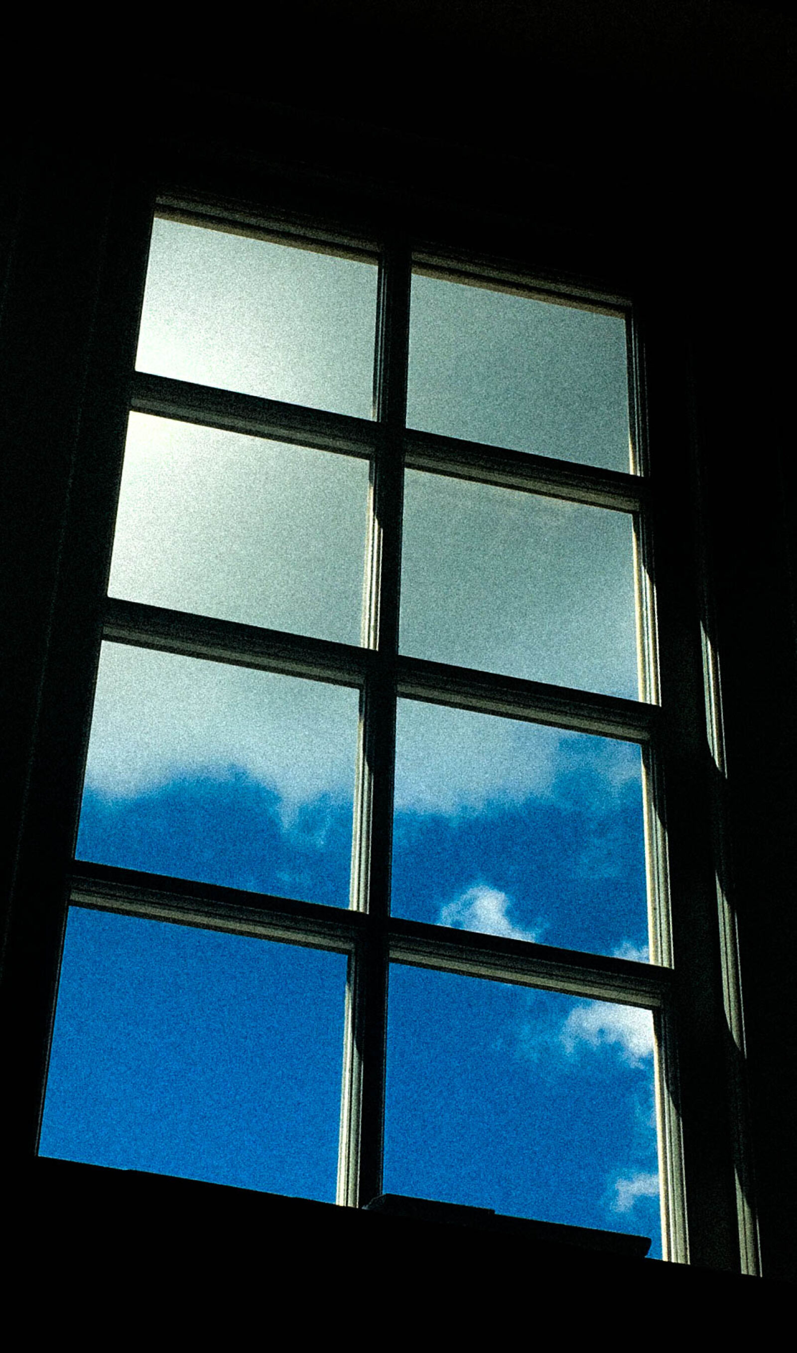 iPhone 6s back camera 4.15mm f/2.2 sample photo. Blue, clouds, glass, window photography
