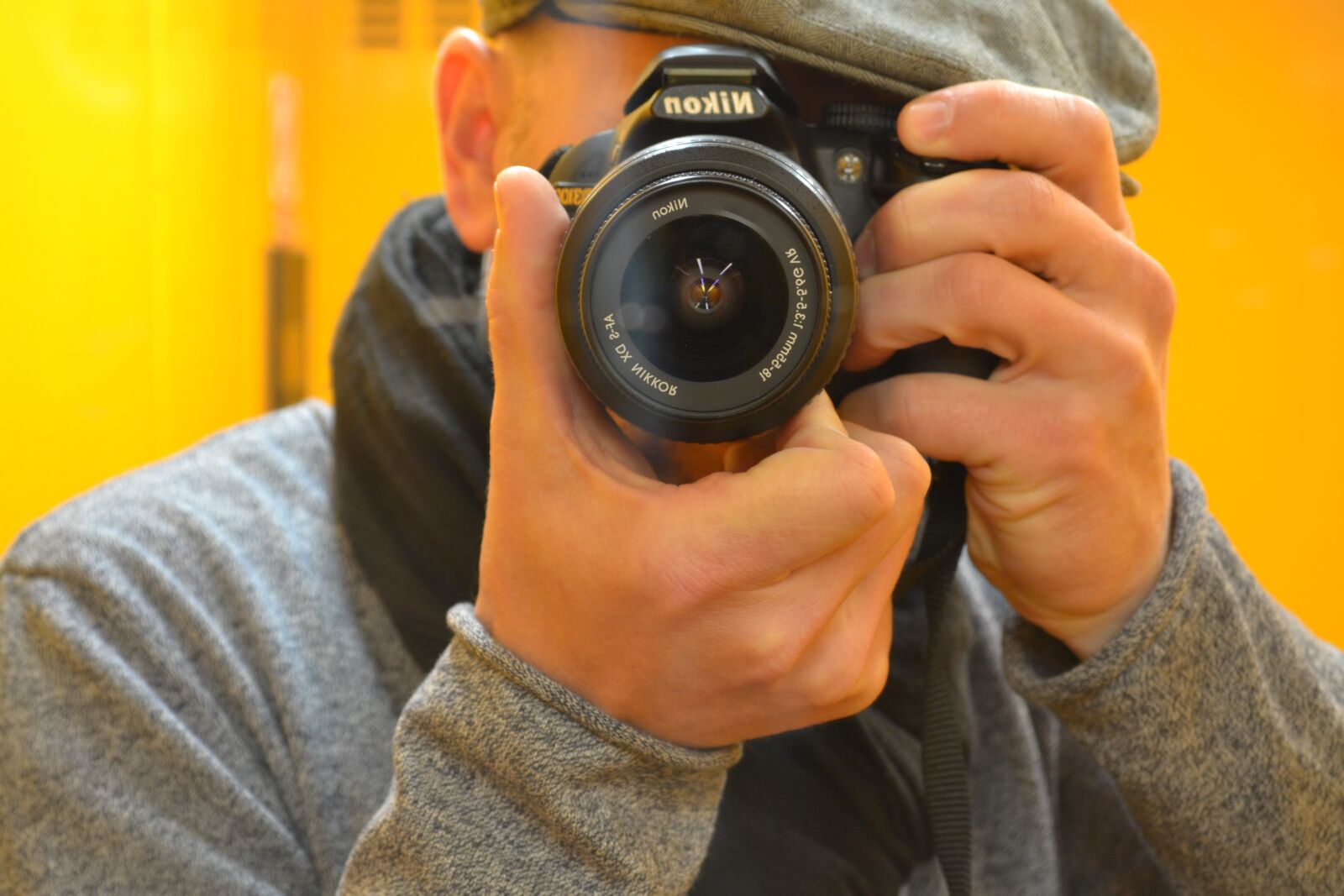 Nikon D3100 sample photo. Photographer, concentration, nikon photography