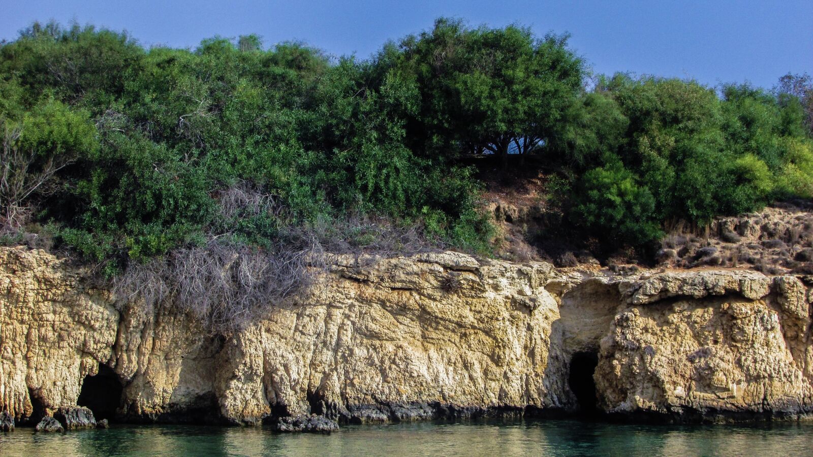 Canon PowerShot SX400 IS sample photo. Sea caves, beach, cliff photography