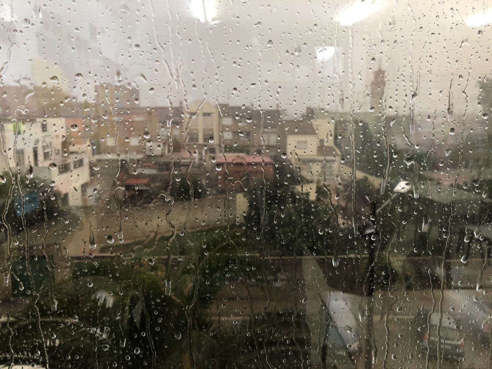Apple iPhone 8 sample photo. Rain, moncada, city photography
