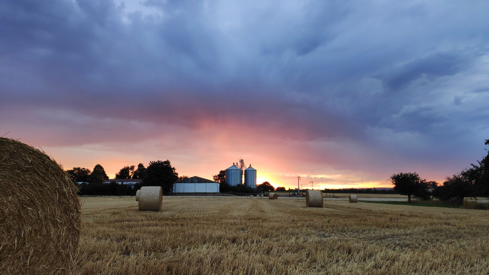 Xiaomi POCO F1 sample photo. Clouds, sun, harvest photography