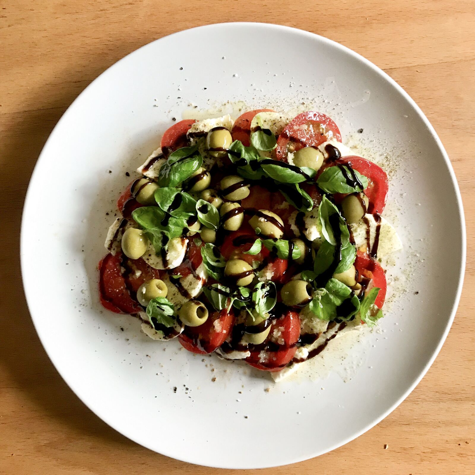 iPhone 7 back camera 3.99mm f/1.8 sample photo. Tomato-mozzarella salad, salad, tomatoes photography