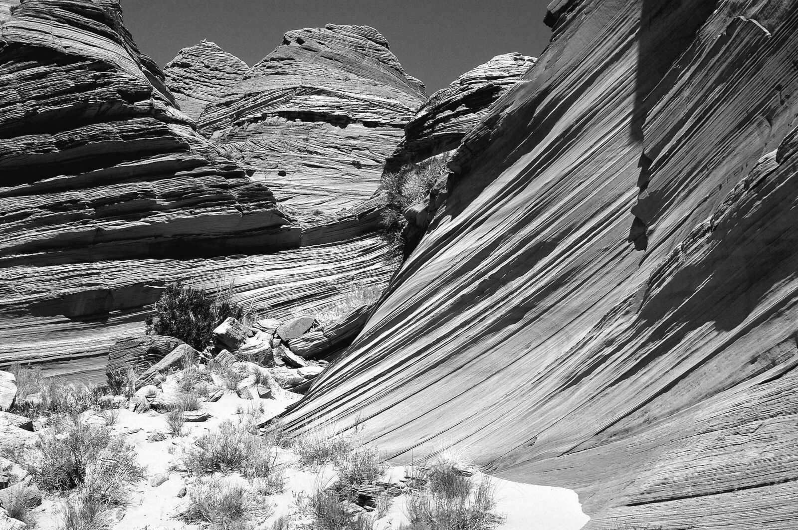 Pentax K100D sample photo. Mountain, rocks, canyon, grass photography