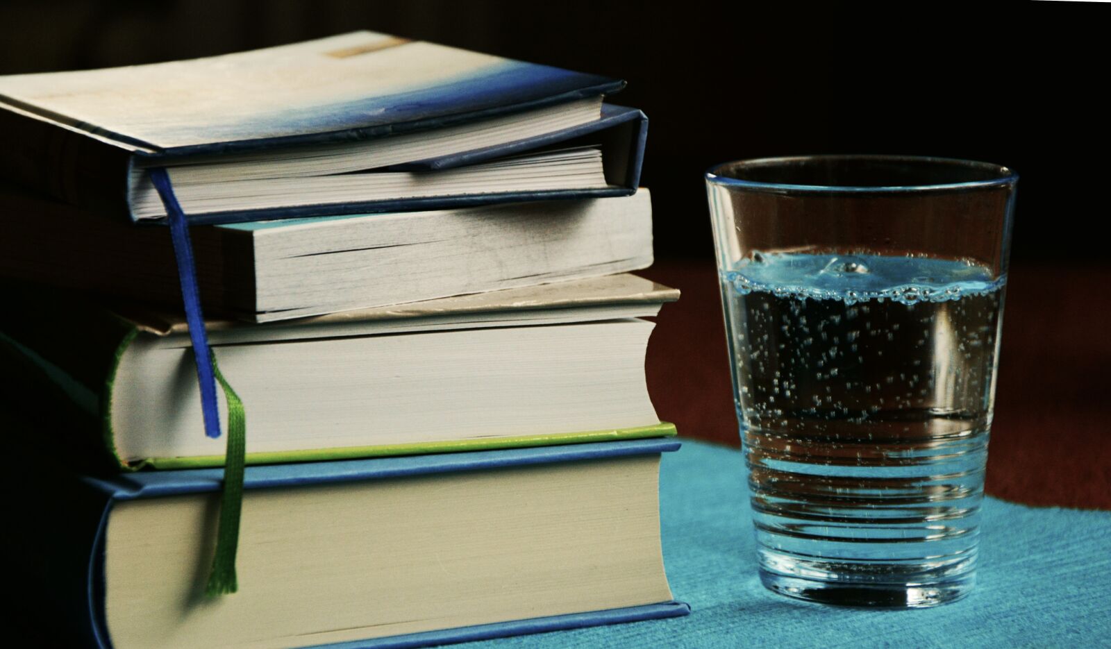 Nikon D5200 sample photo. Books, book stack, water photography
