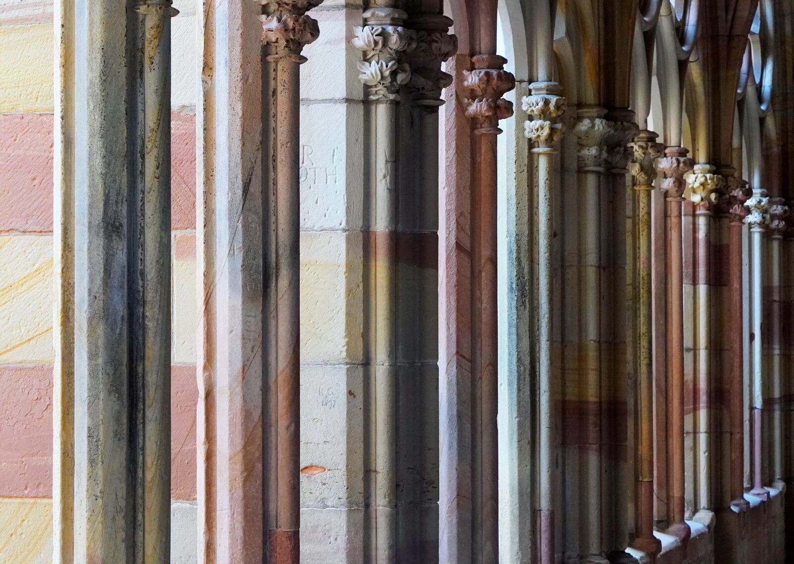 E 50mm F1.8 OSS sample photo. Romanesque, cloister, monastery photography