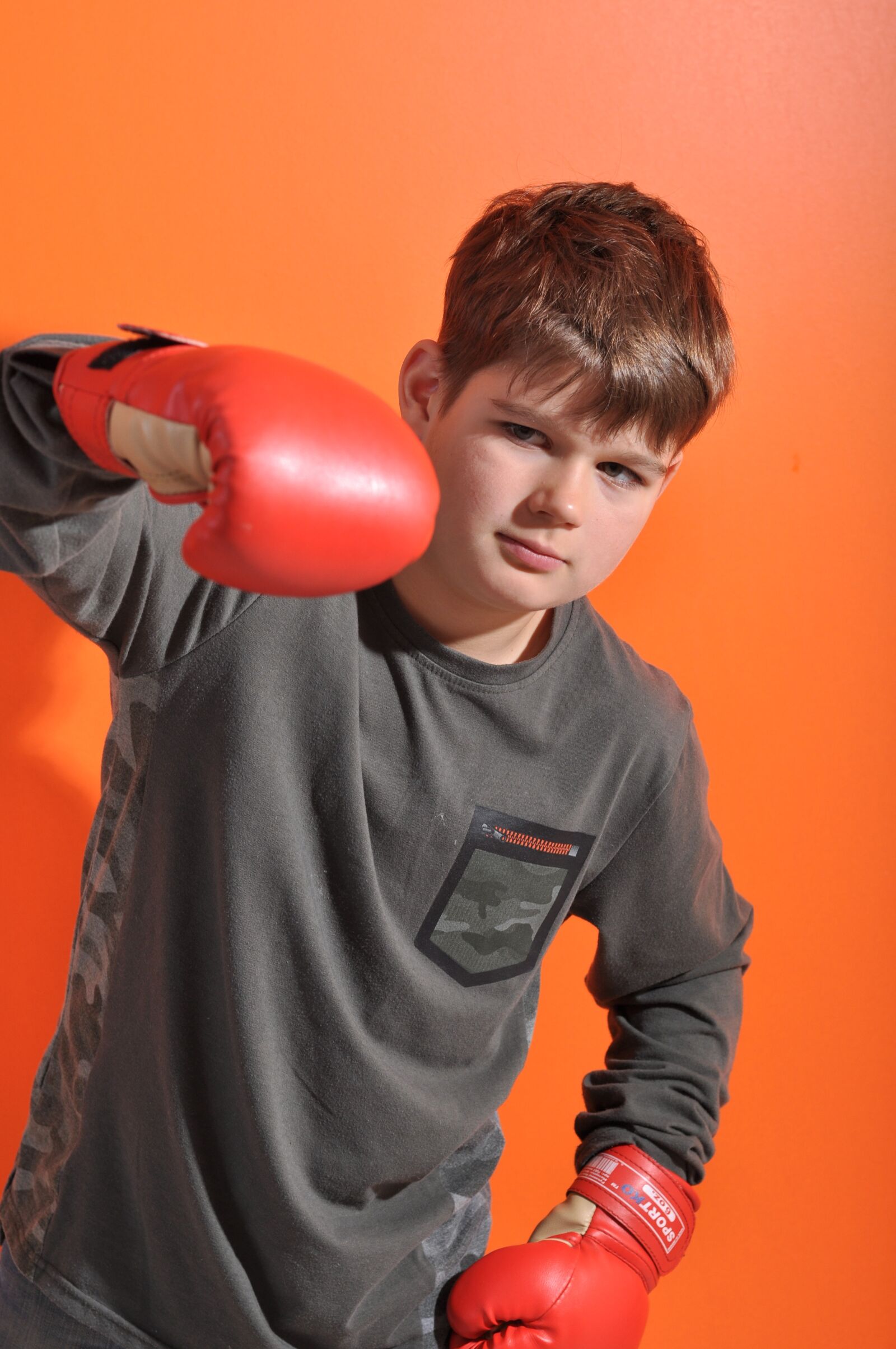 Nikon D5000 sample photo. Young, glove, power photography