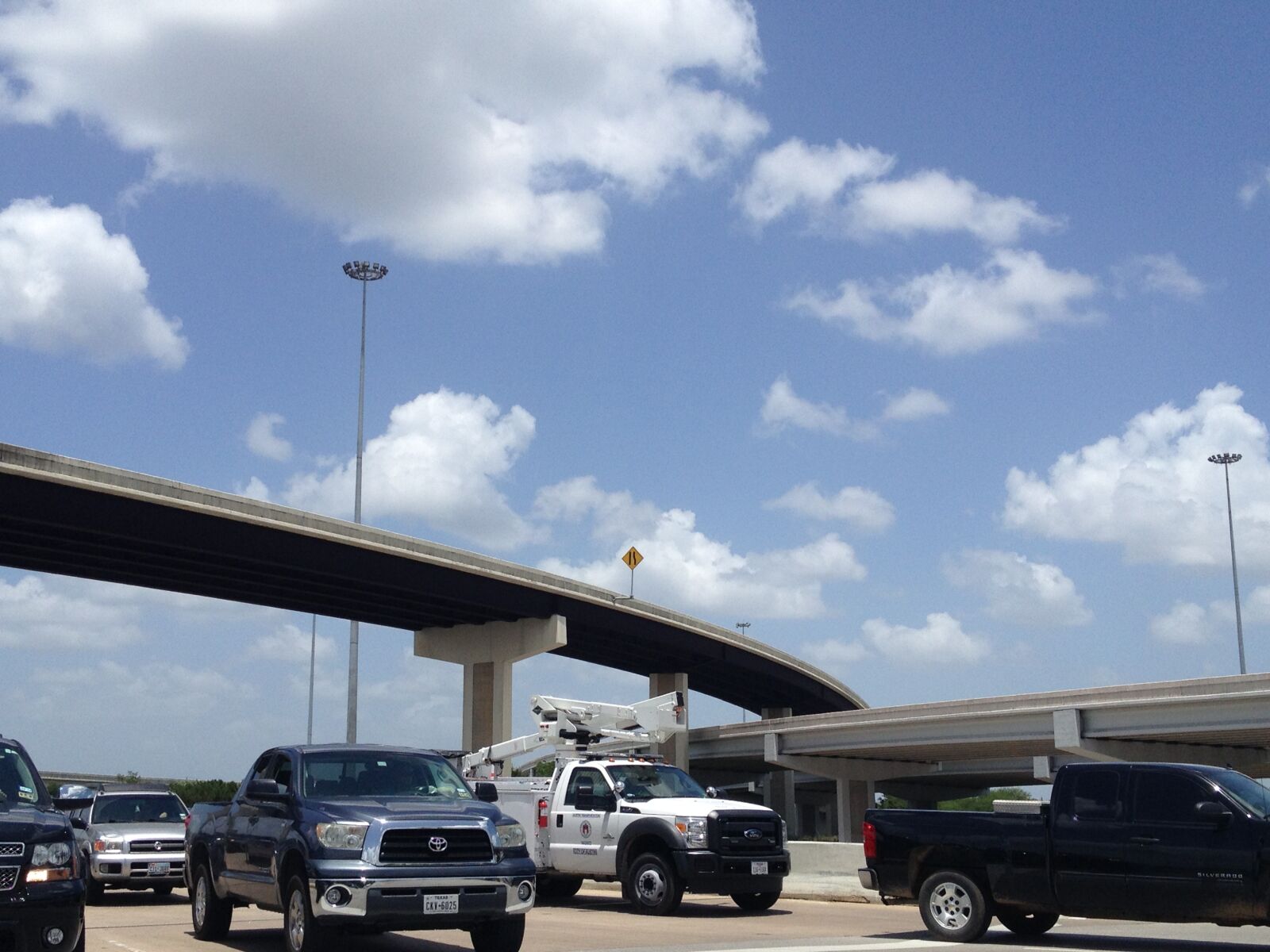 Apple iPhone 4S sample photo. Sky, highway, trucks photography