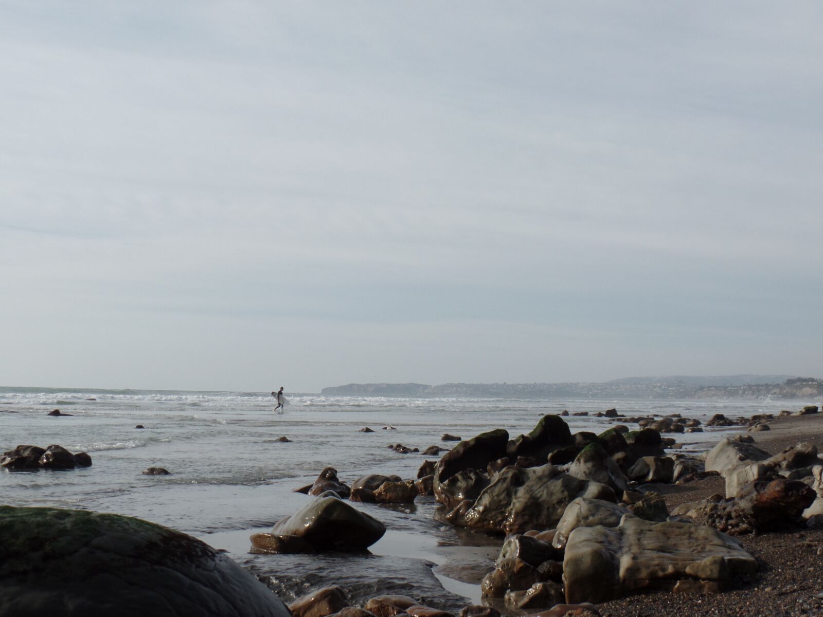 Samsung WB350F/WB351F/WB352F sample photo. Surfer, rocks, beach photography