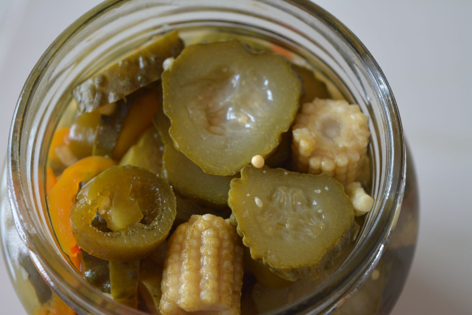 Nikon D5200 sample photo. Pickle, corn, jar photography