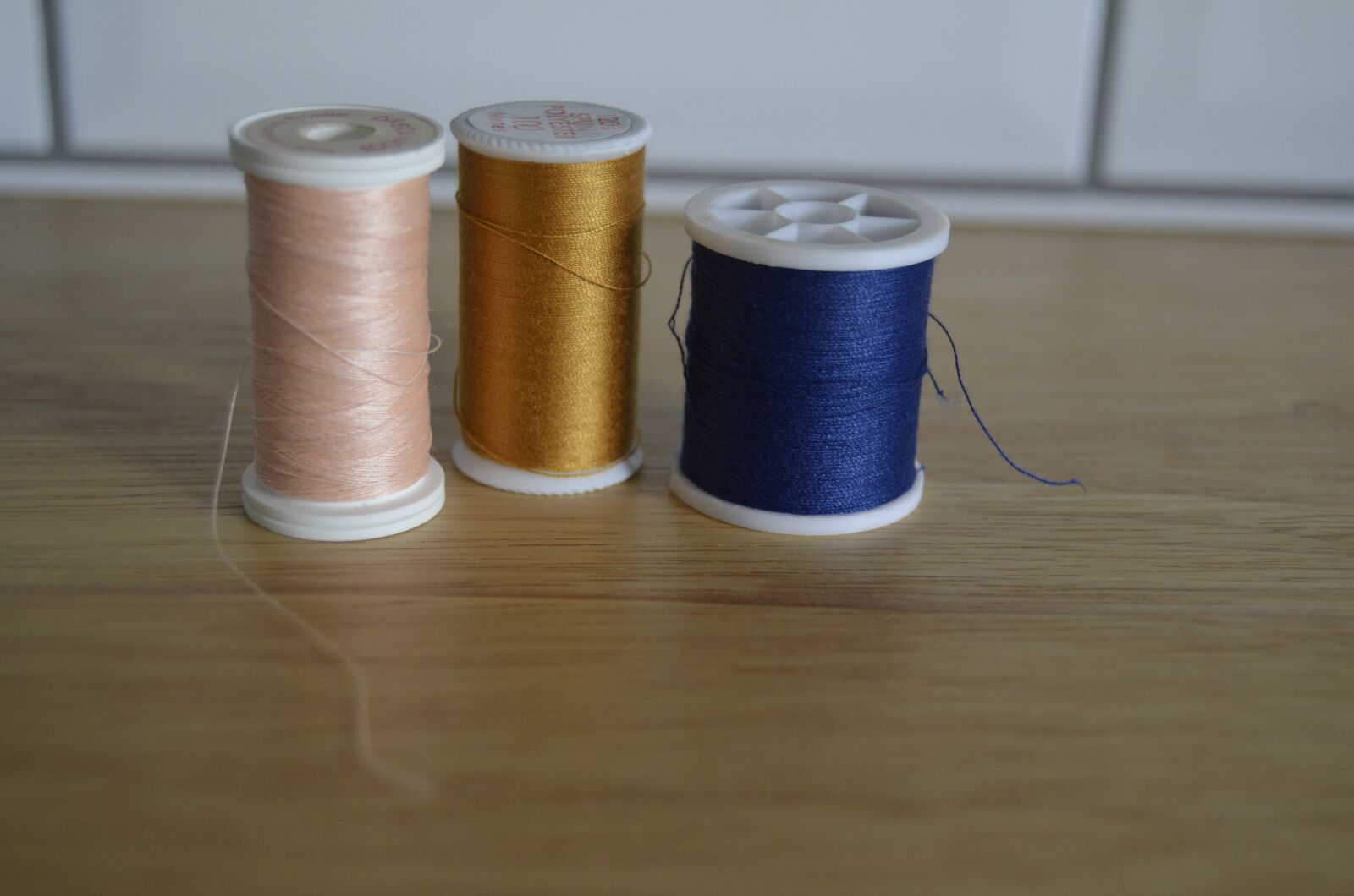 Nikon D5100 sample photo. Thread, sewing, craft photography