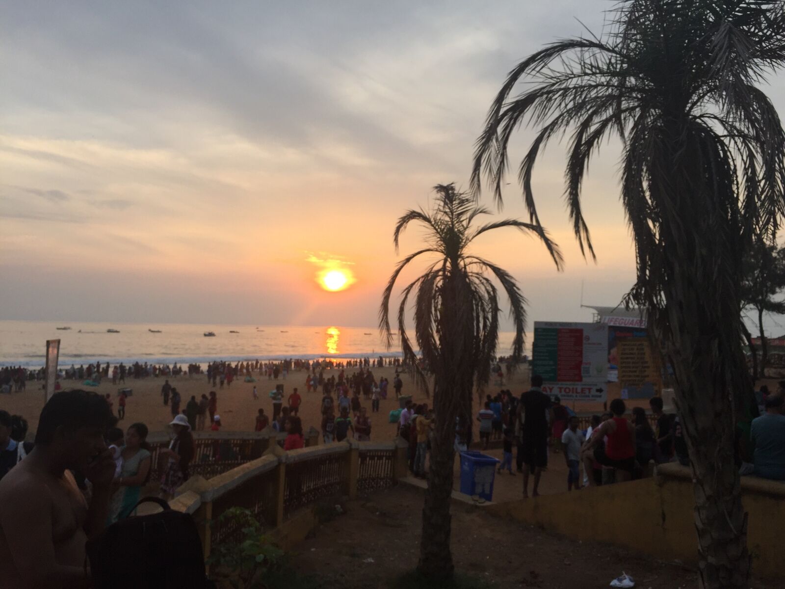 iPhone 6 back camera 4.15mm f/2.2 sample photo. Beach, crowdy, dusk, evening photography