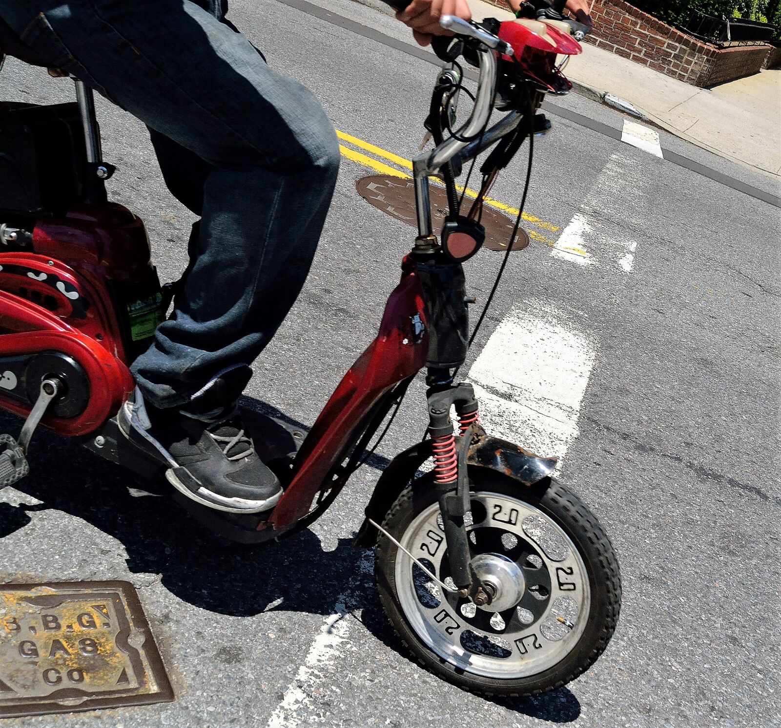 Nikon D3100 sample photo. Red scooter, jeans, sneakers photography