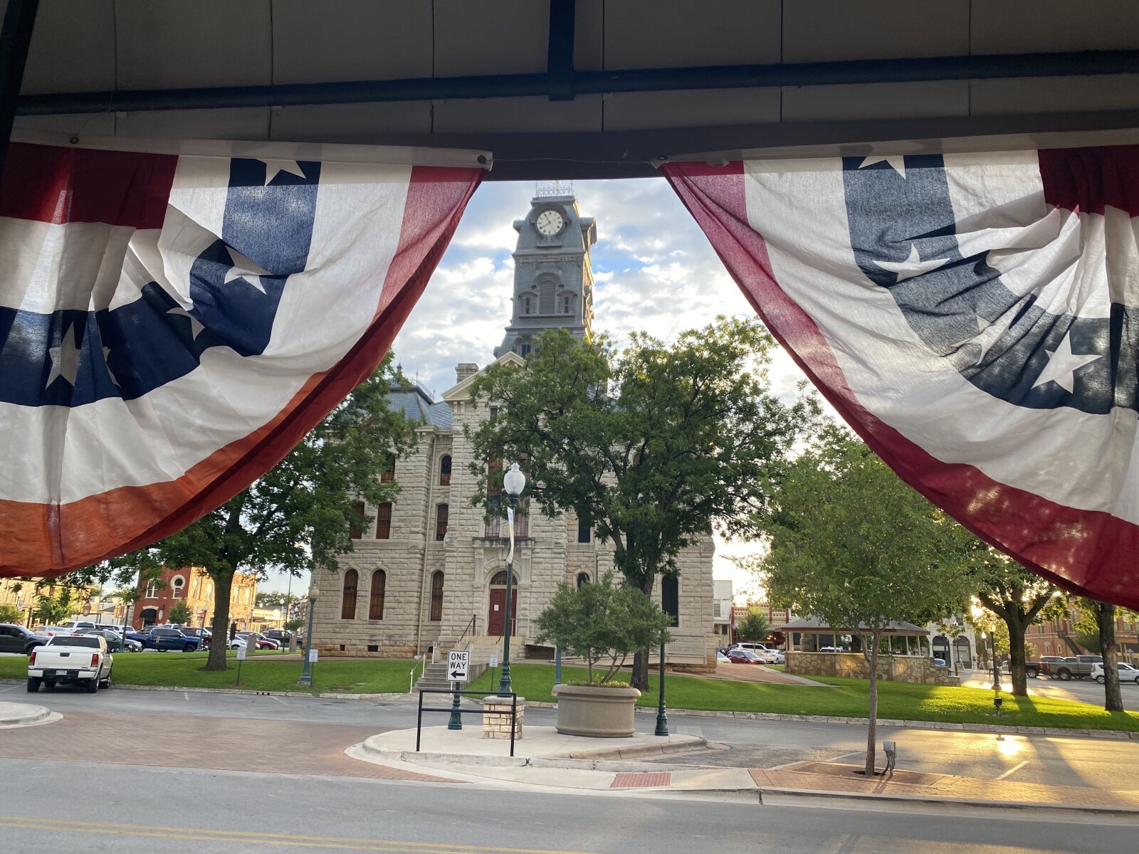 Apple iPhone 11 Pro + iPhone 11 Pro back triple camera 4.25mm f/1.8 sample photo. July 4, texas courthouse, courthouse photography