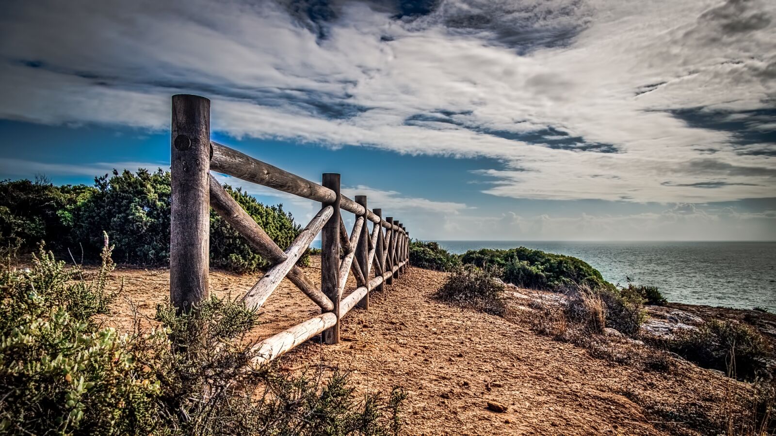 Canon EF-S 17-85mm F4-5.6 IS USM sample photo. Fence, seaside, ocean photography