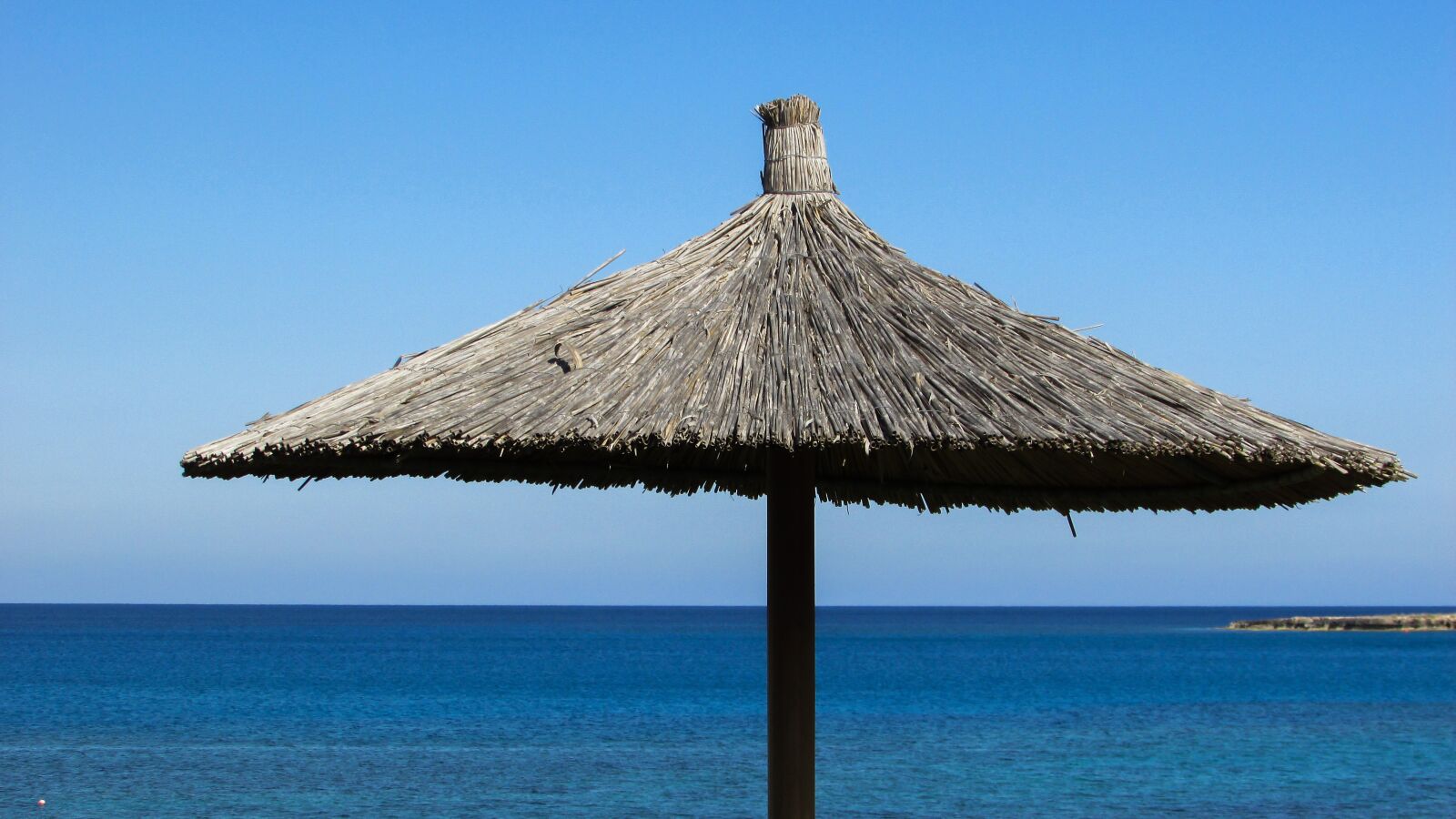 Canon PowerShot SX400 IS sample photo. Umbrella, sea, resort photography