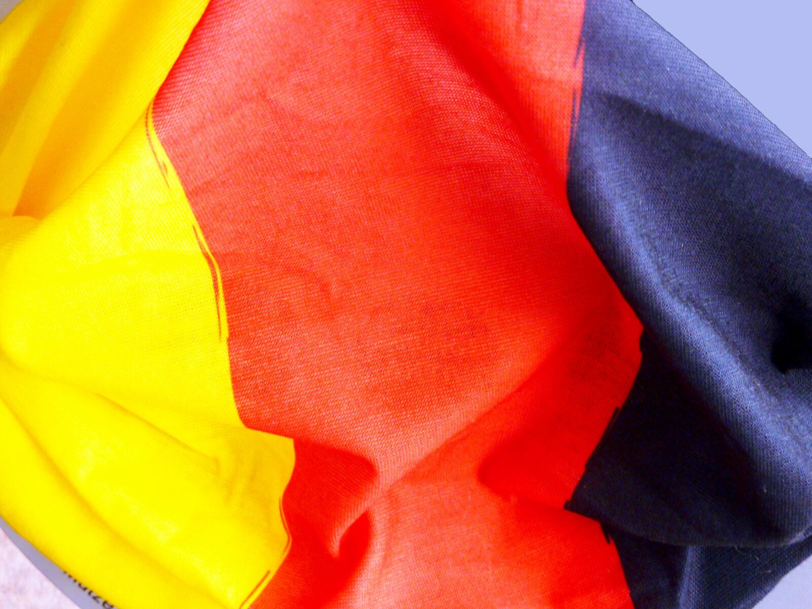 Panasonic DMC-TZ7 sample photo. Flag, banner, black red photography