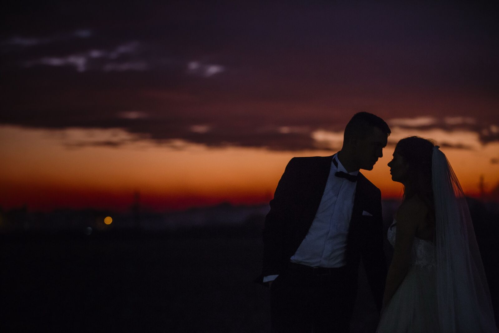 Canon EOS 5D Mark III sample photo. Sunset, romance, bride, embrace photography