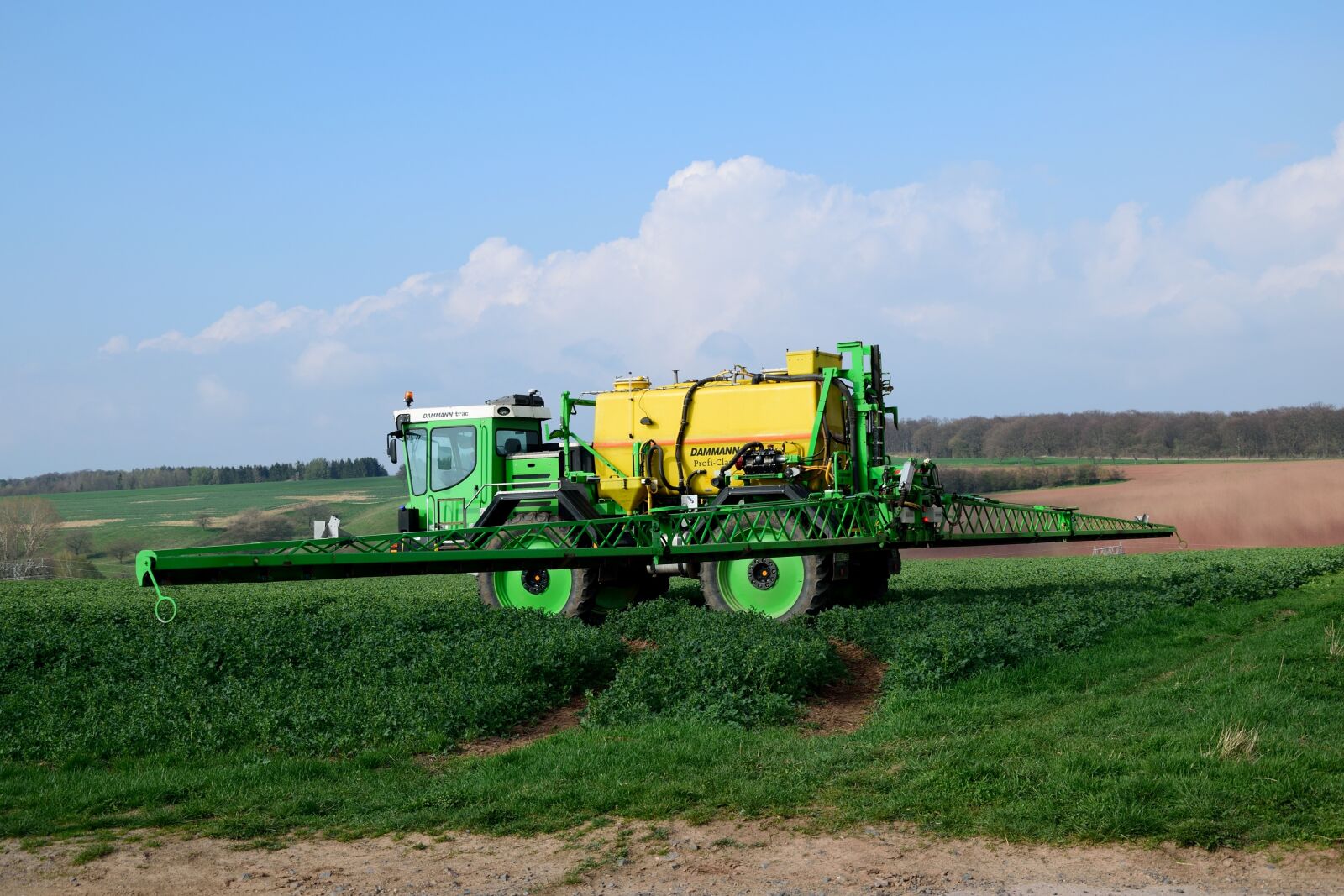 Nikon D3300 sample photo. Field, agricultural vehicle, fertilize photography
