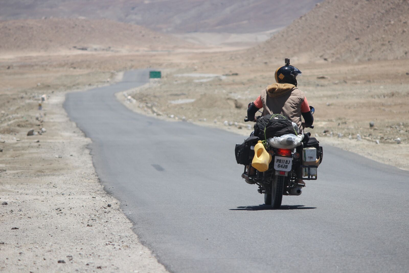 Canon EF-S 55-250mm F4-5.6 IS II sample photo. Rider, himalyan, bullet photography