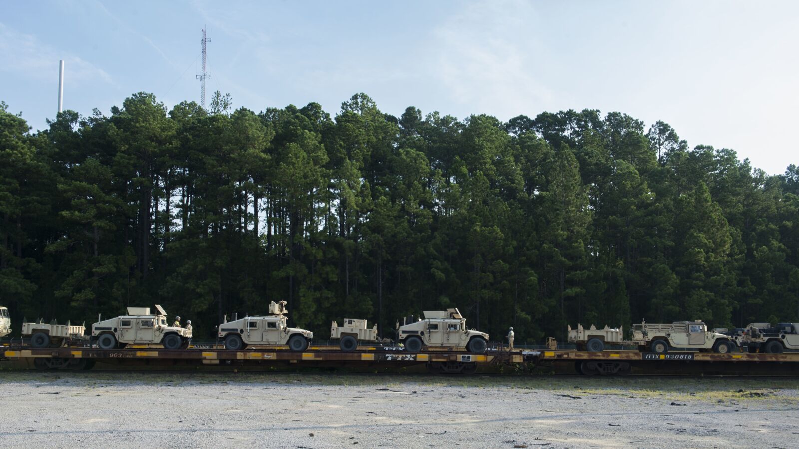 Nikon D4S sample photo. Rail operations, loaded, humvees photography