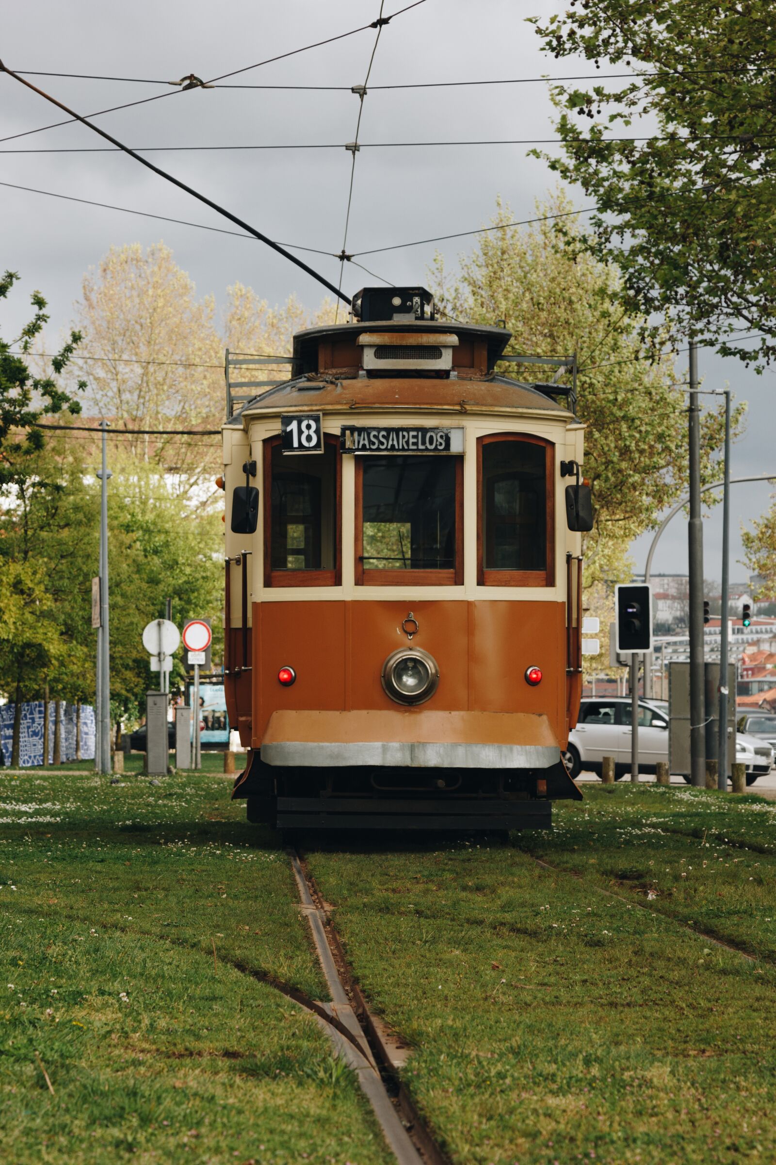 Canon EOS 60D + Canon EF 24-105mm F4L IS USM sample photo. Old red tram, cityscape photography