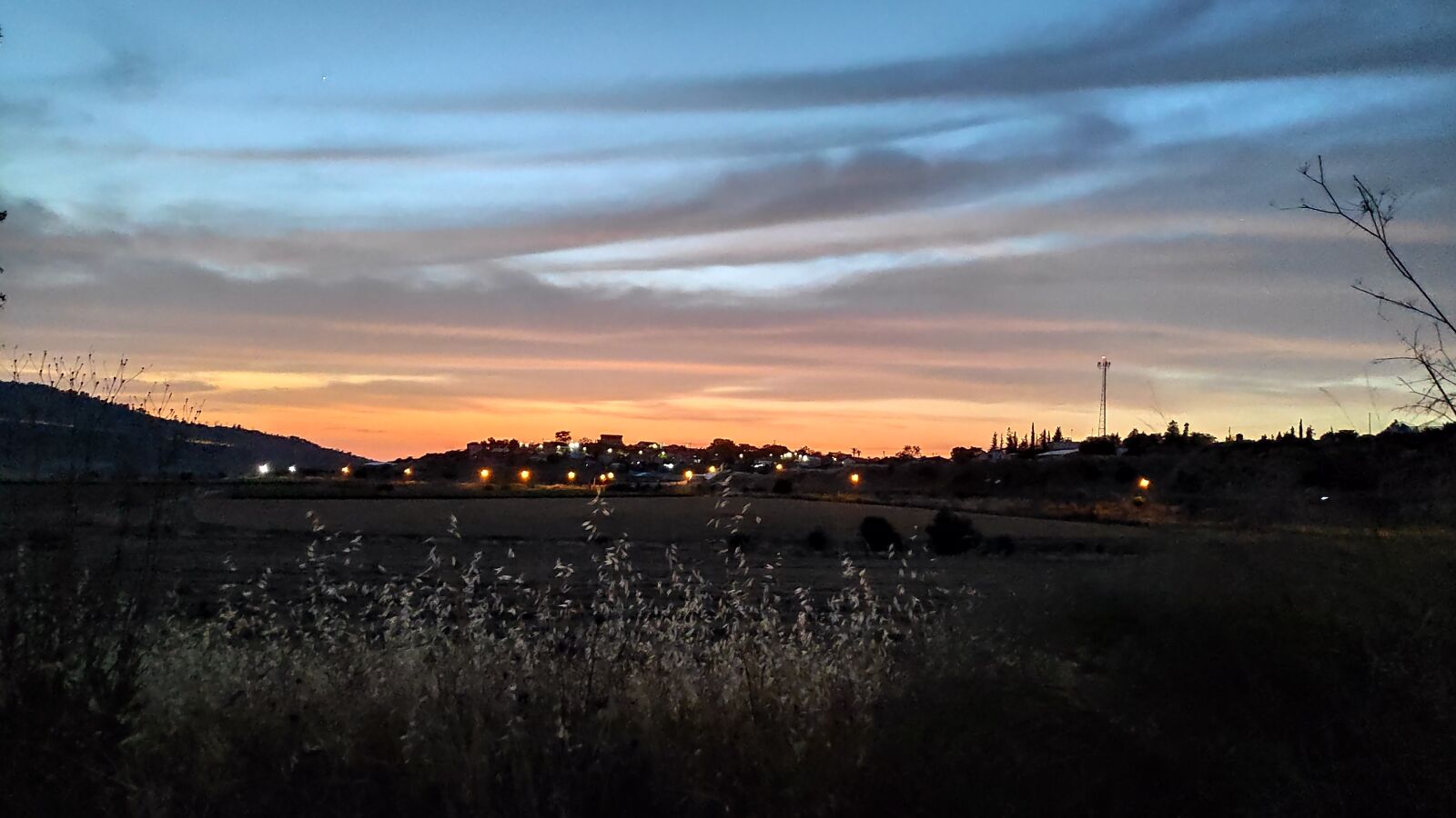 Xiaomi POCO F1 sample photo. Sunset, field, lights photography