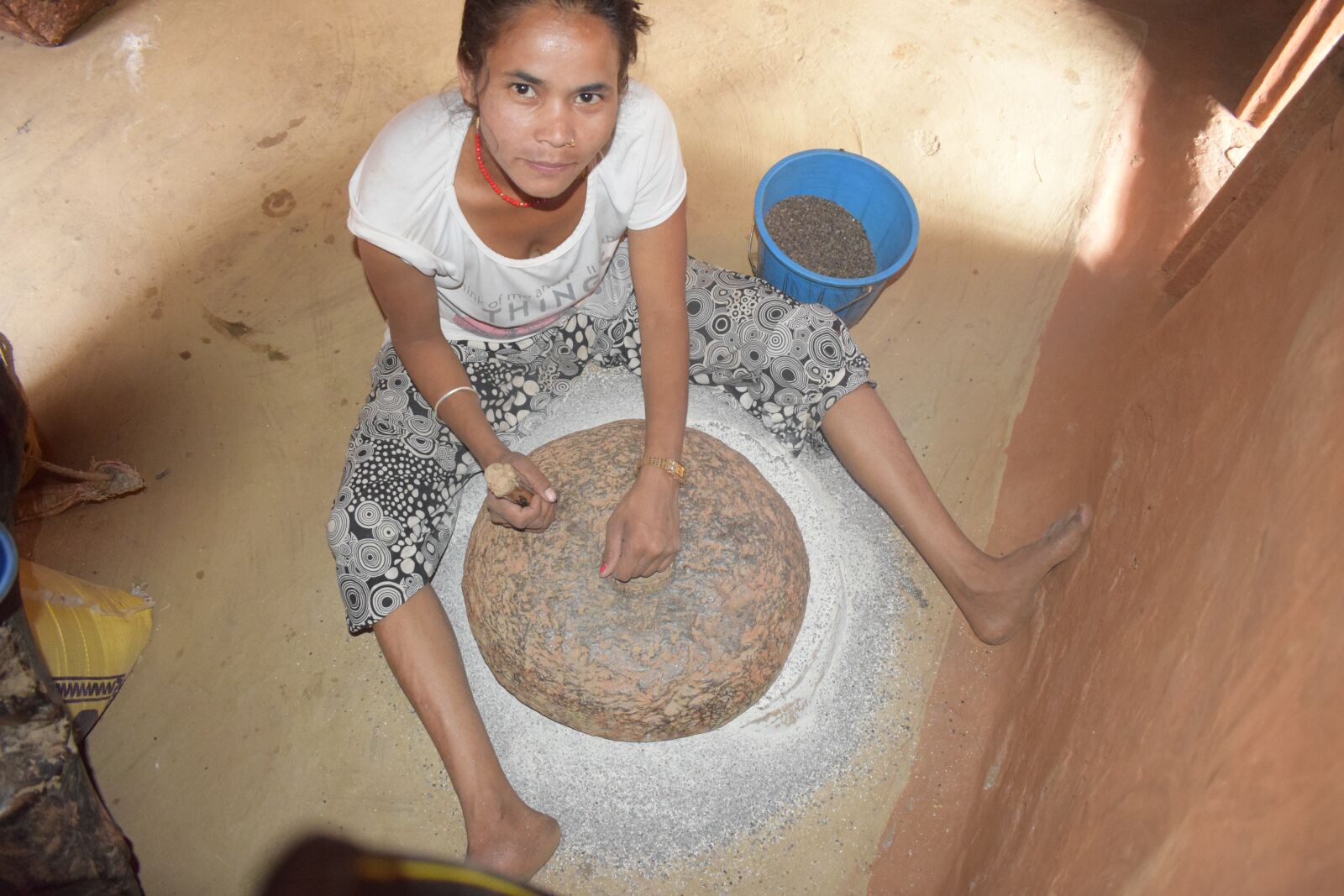 Nikon D5300 sample photo. Stone grinding mill, female photography