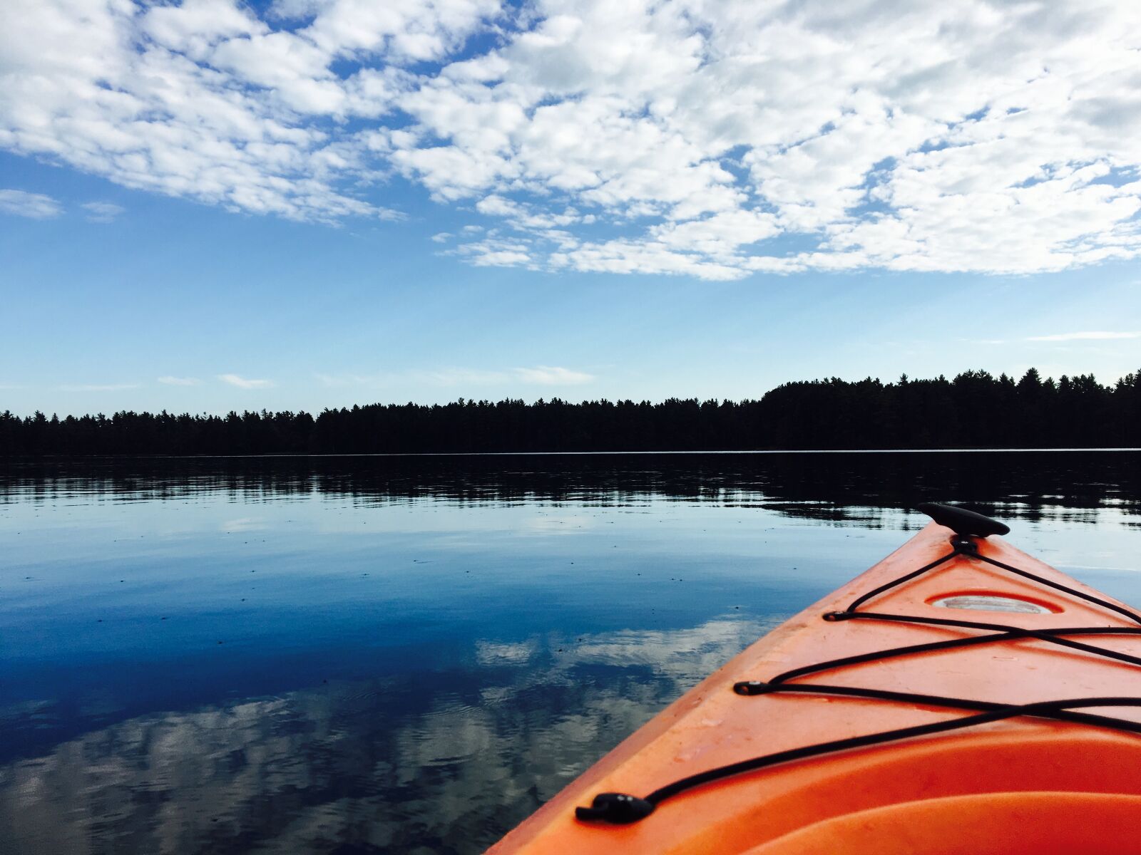 Apple iPhone 6s sample photo. Kayak, water, clouds photography
