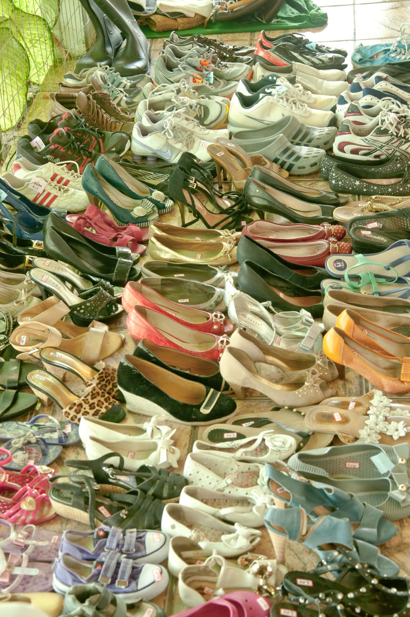 Nikon D90 sample photo. Donation, shoes, solidarity photography