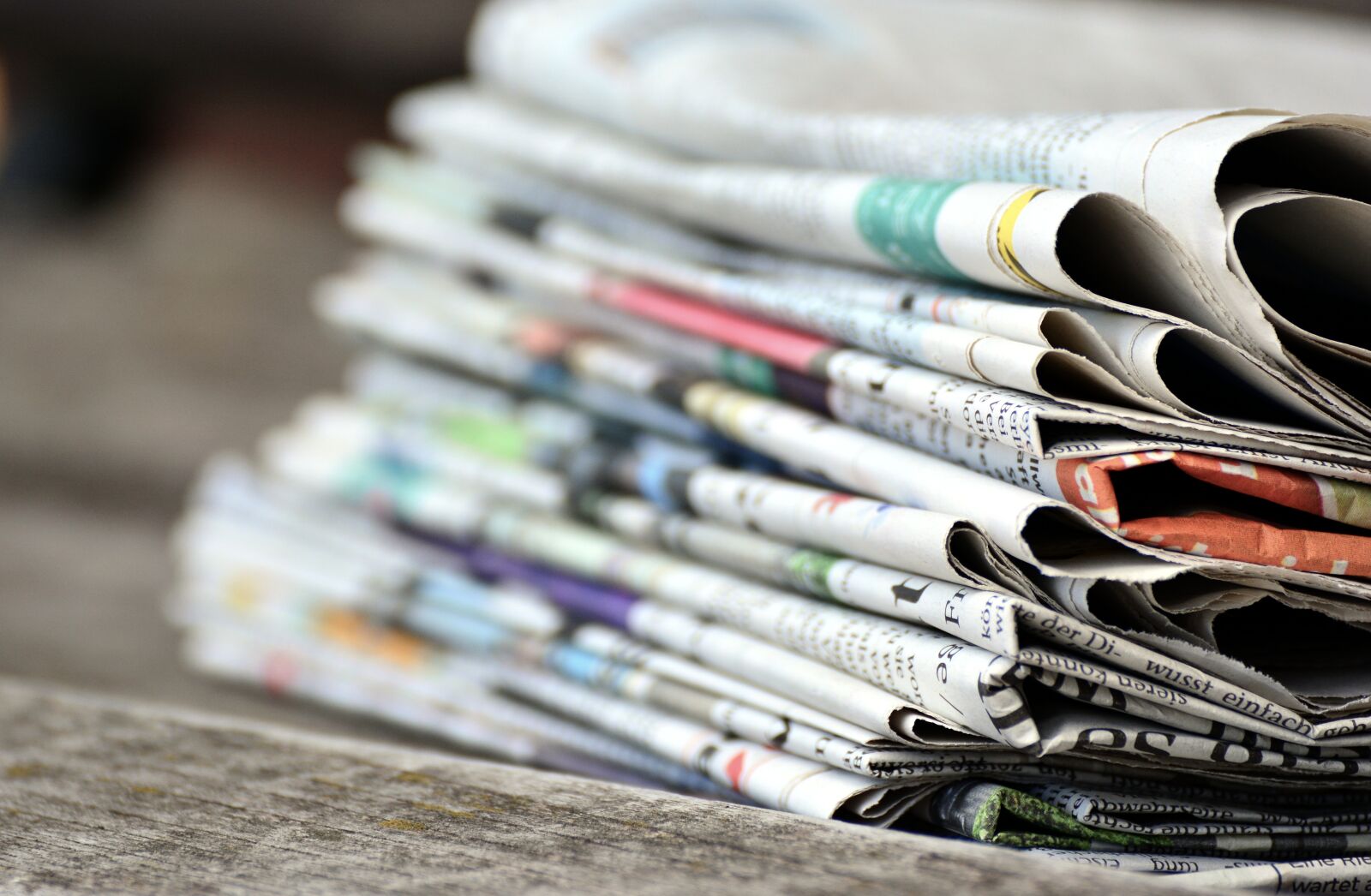 Nikon D5200 sample photo. Newspapers, paper stack, press photography