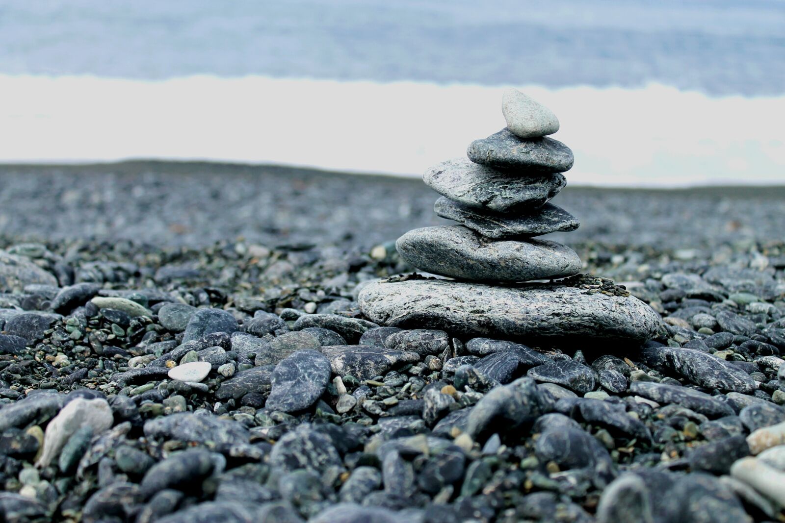 Canon EOS 1100D (EOS Rebel T3 / EOS Kiss X50) sample photo. Corsica, cairn, beach photography