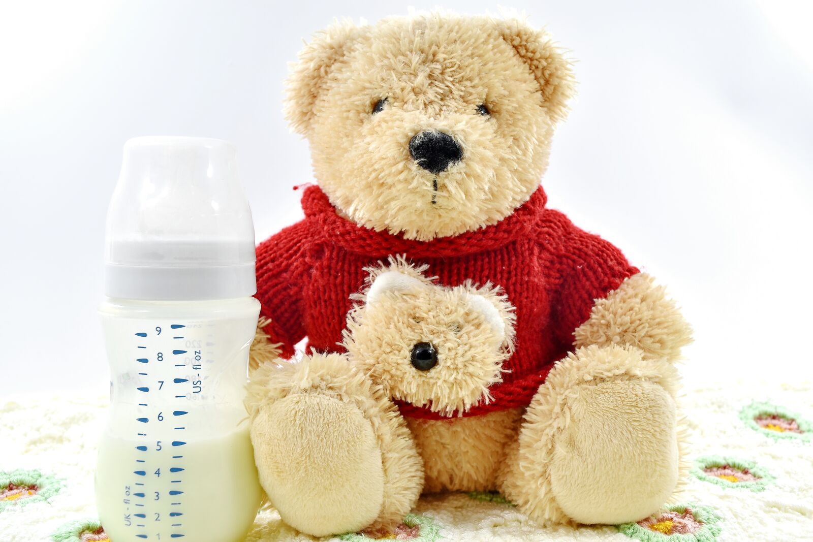Nikon D5500 sample photo. Baby, blanket, bottle, knitwear photography