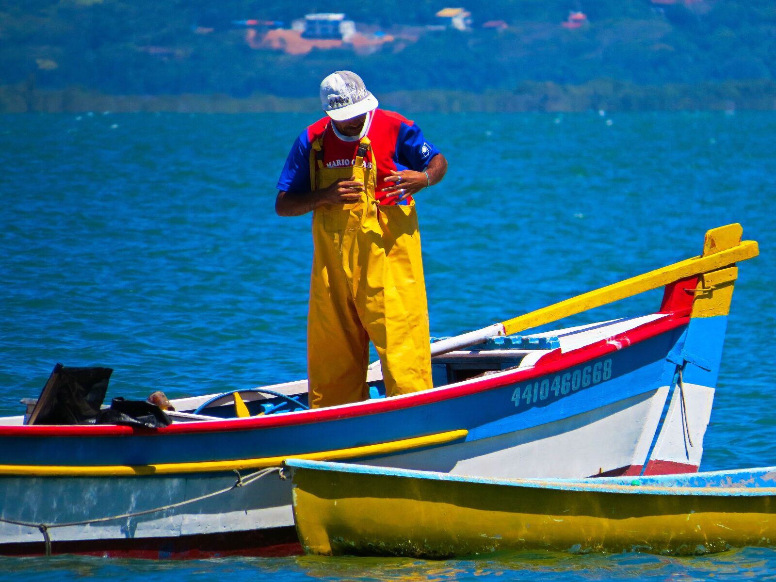 Canon PowerShot SX50 HS sample photo. Fisherman, boat, sea photography