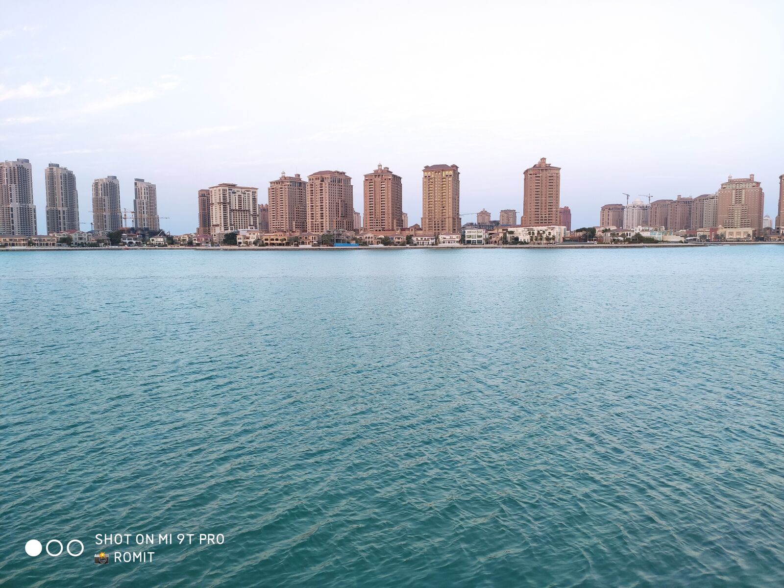 Xiaomi Mi 9T Pro sample photo. Buildings, beach, water photography