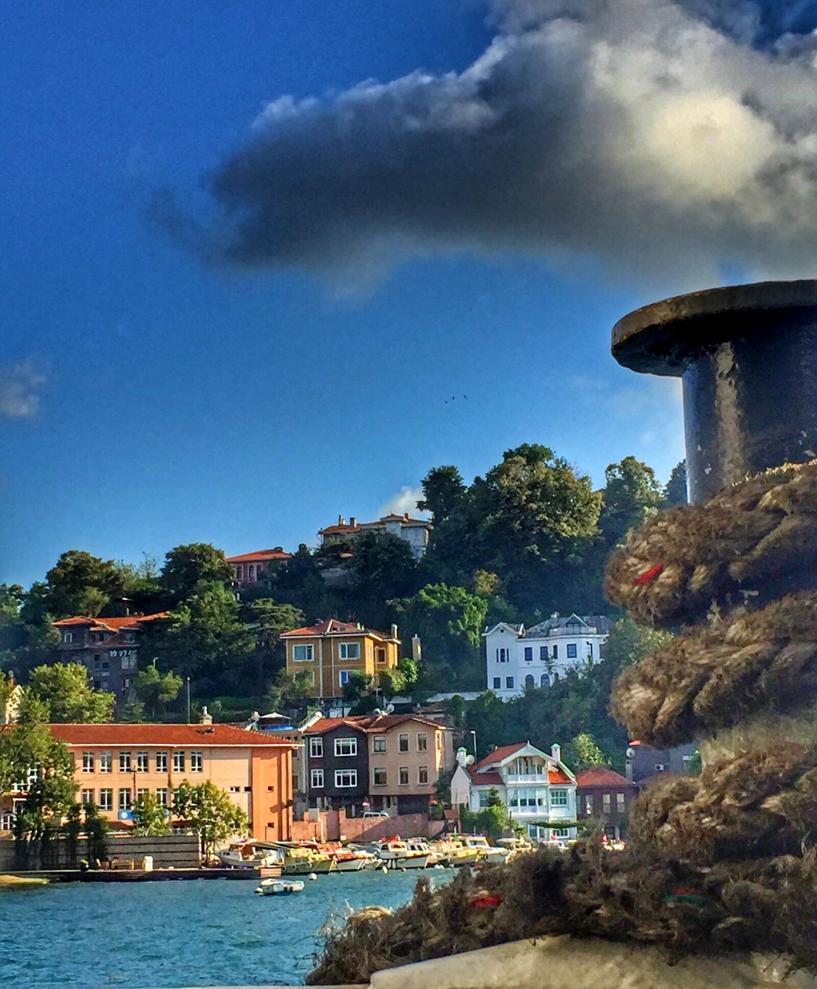 iPhone 6 back camera 4.15mm f/2.2 sample photo. Colorful, houses, rope photography