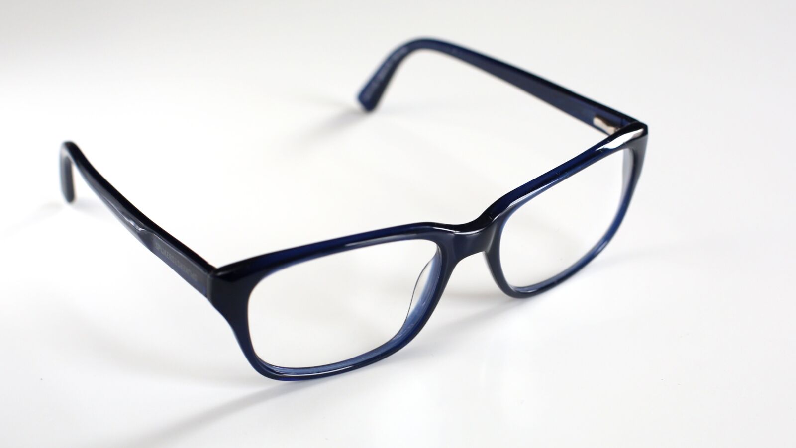 Canon EF 50mm F1.4 USM sample photo. Glasses, reading glasses, blue photography