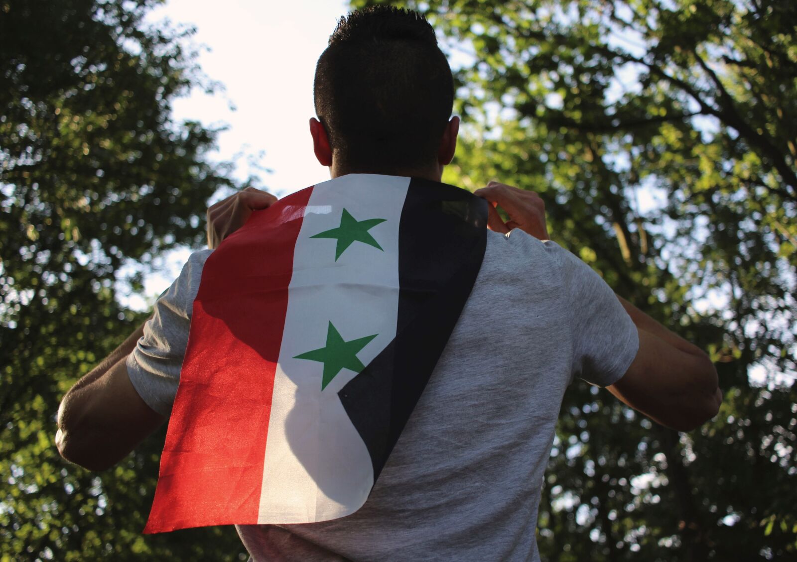 Canon EF-S 24mm F2.8 STM sample photo. Human, move, flag photography