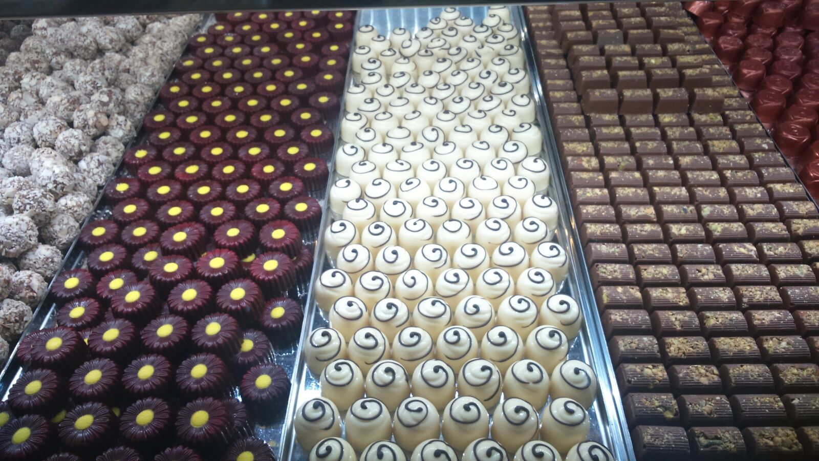 Sony Xperia M2 sample photo. Chocolates, milk chocolate, white photography