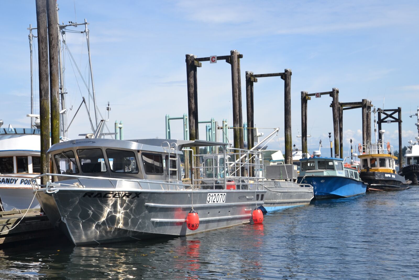 Nikon D3100 sample photo. Boat, harbor, water photography