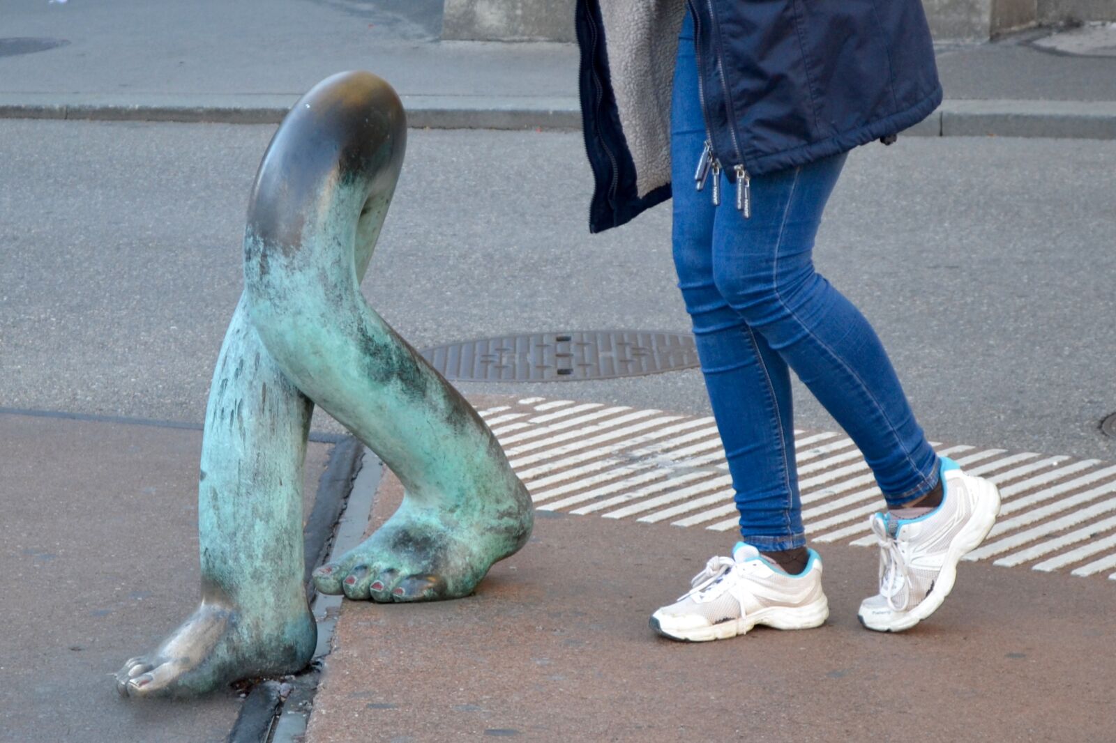 Nikon D3100 sample photo. City, legs, statue, street photography