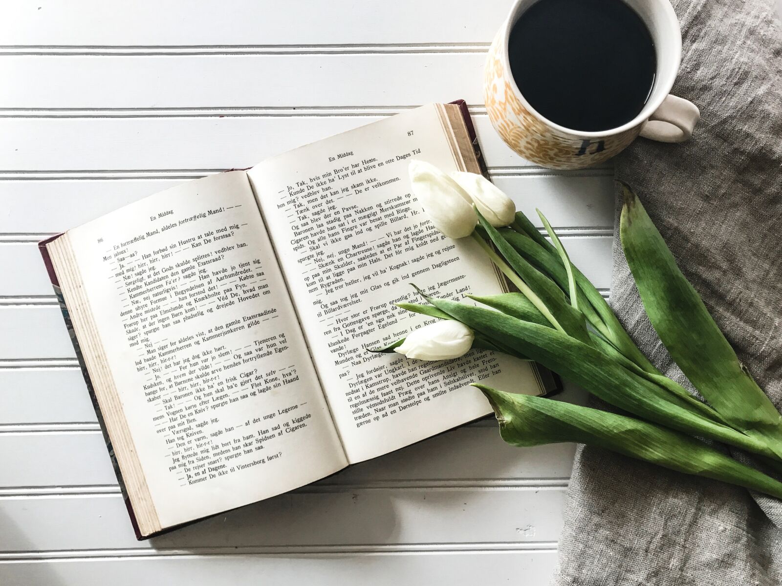 Apple iPhone 7 sample photo. Open book, tulips, from photography