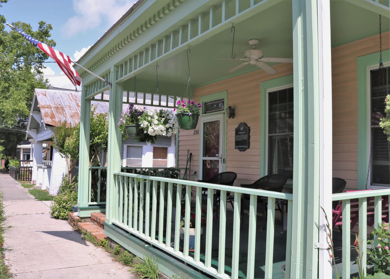 Canon EOS 750D (EOS Rebel T6i / EOS Kiss X8i) sample photo. Front porch, american flags photography
